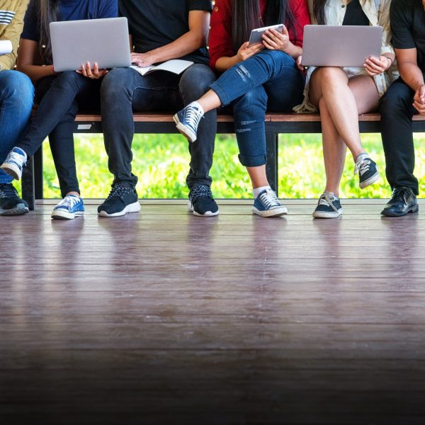 students sitting on a bench