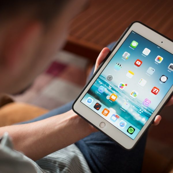 a person using an iPad
