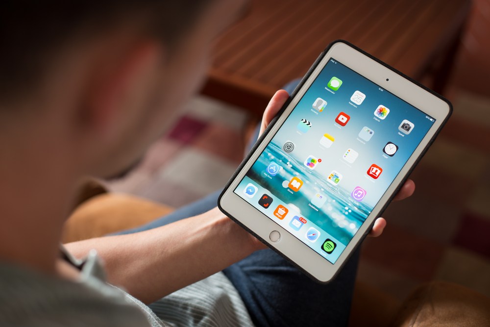 a person using an iPad