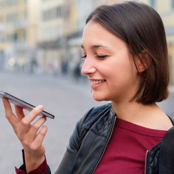 Woman speaking into her phone