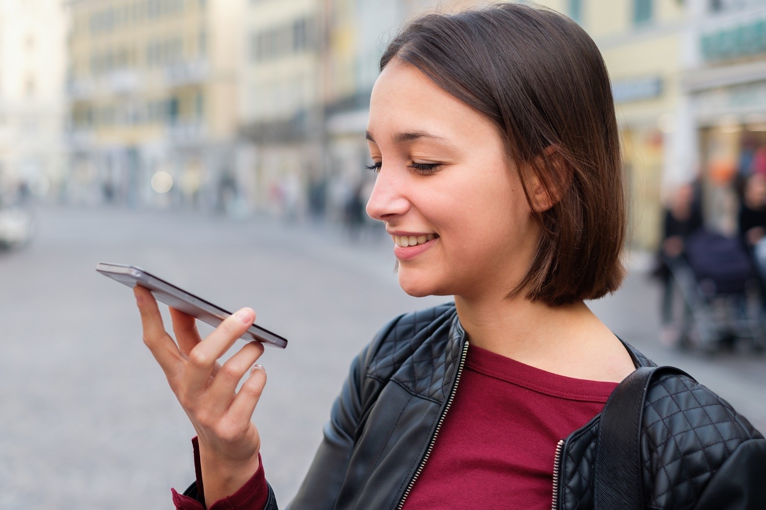 Woman speaking into her phone