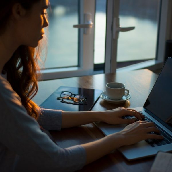 Woman working at a laptop