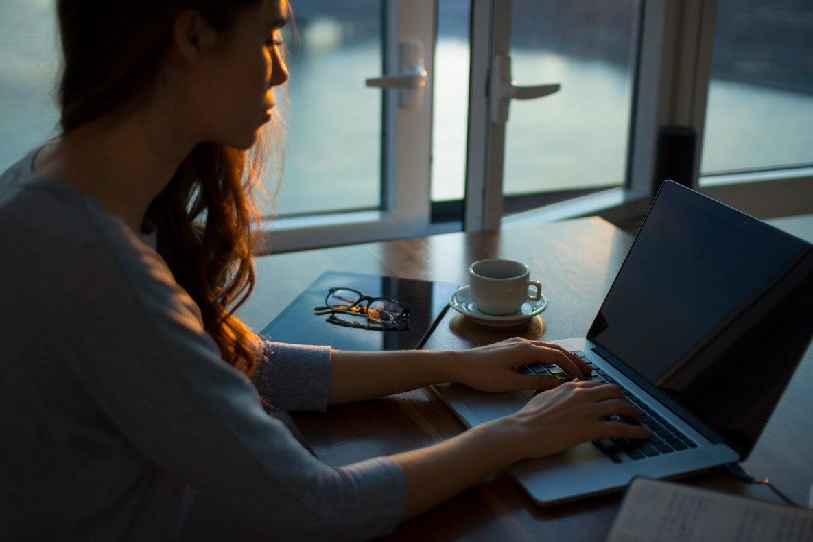 Woman working at a laptop