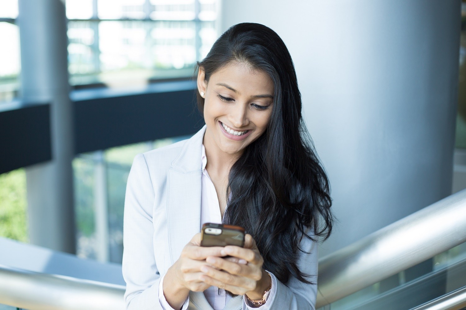 a woman using a smartphone