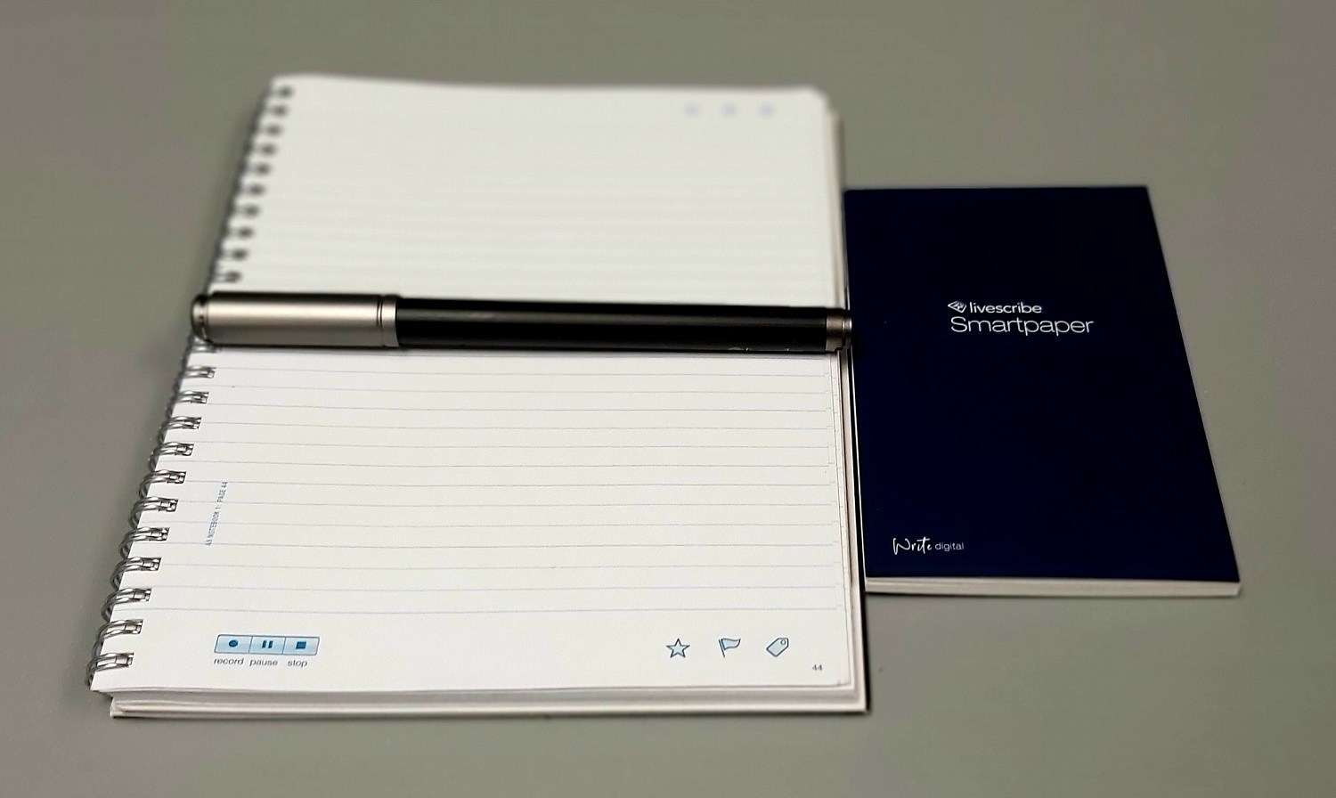 A LiveScribe pen and notebook