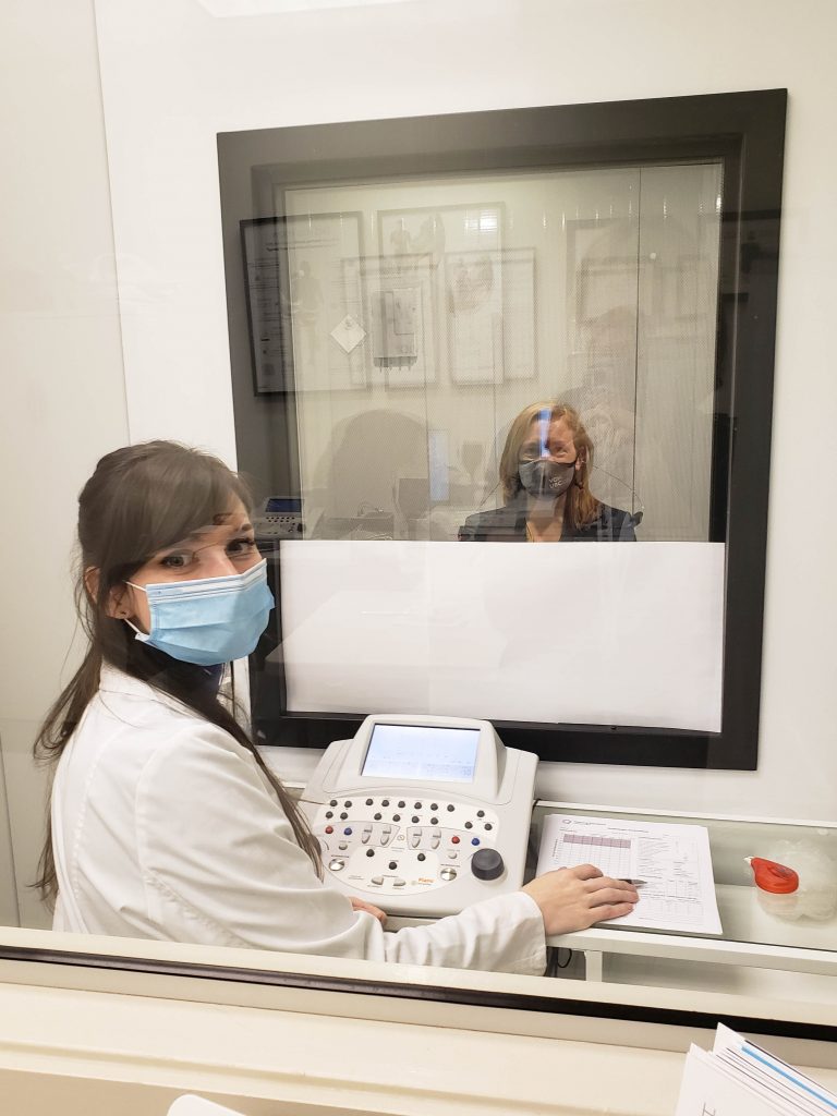 Brenda Bailey getting a hearing evaluation in our Hearing Solutions lab