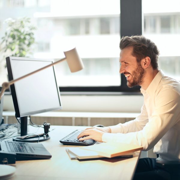 a man works on a computer