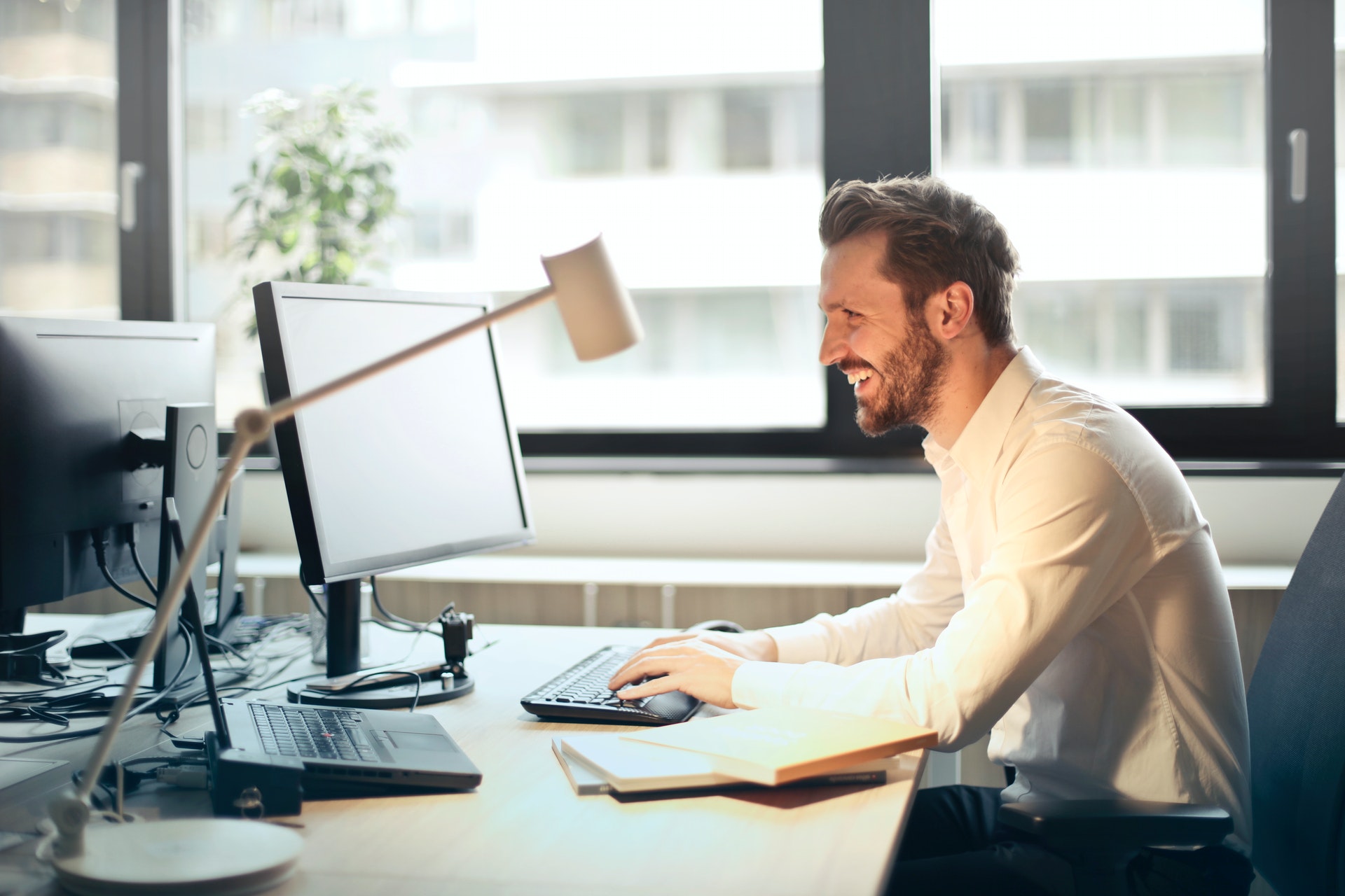 a man works on a computer