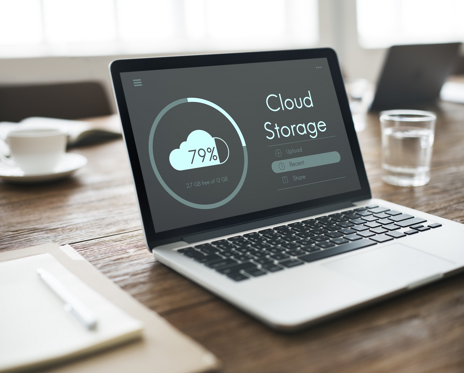 a laptop displaying cloud storage