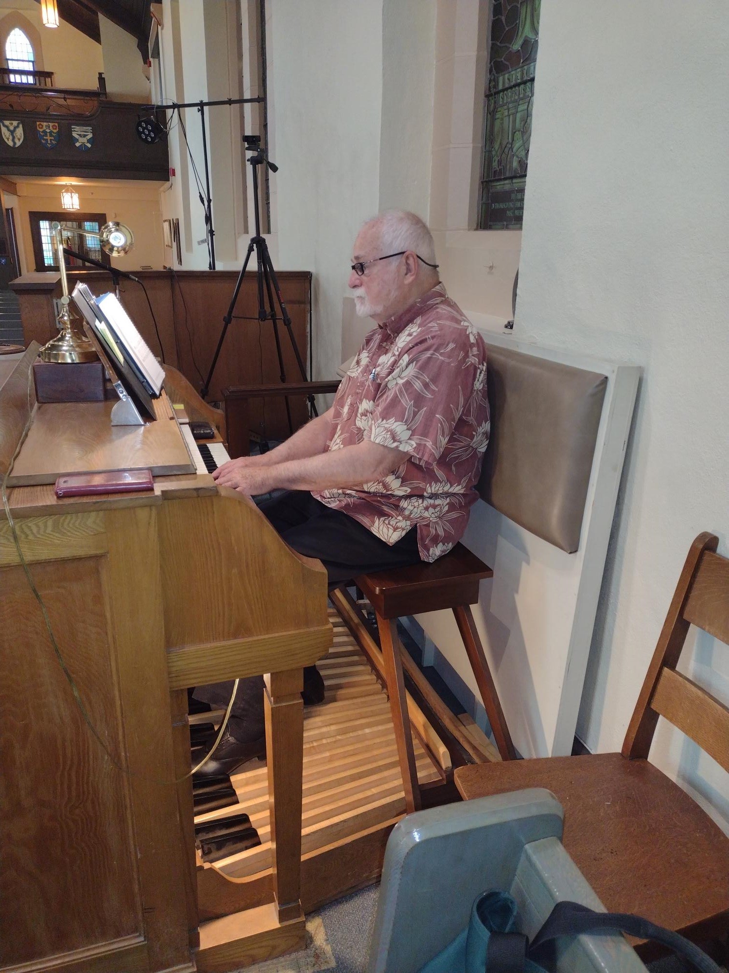 WorkBC Assistive Technology Services participant Freeman playing the organ at his church