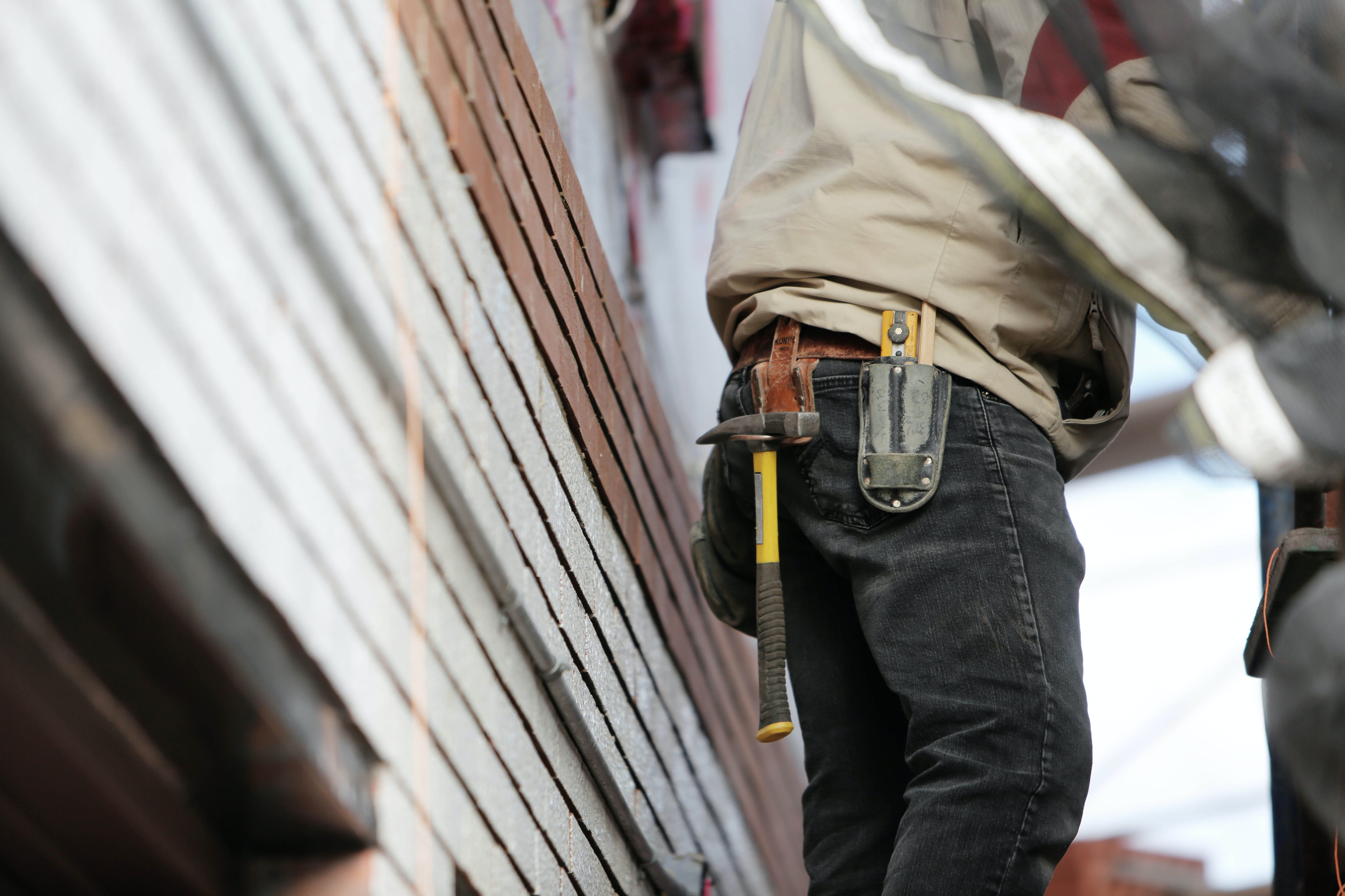 a contractor wearing a toolbelt