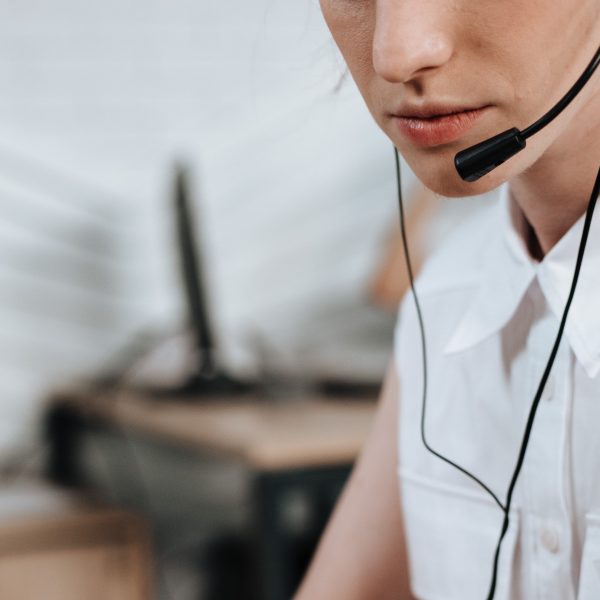 a woman talking on a headset