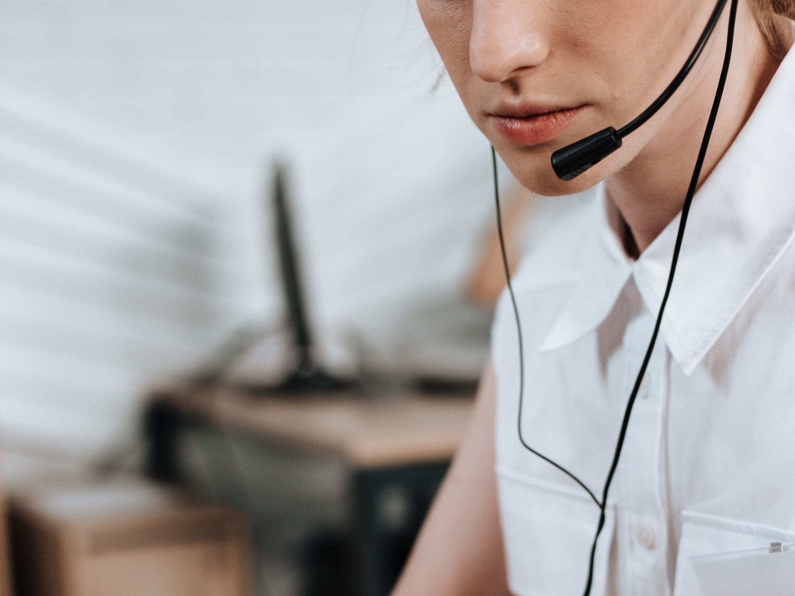 a woman talking on a headset