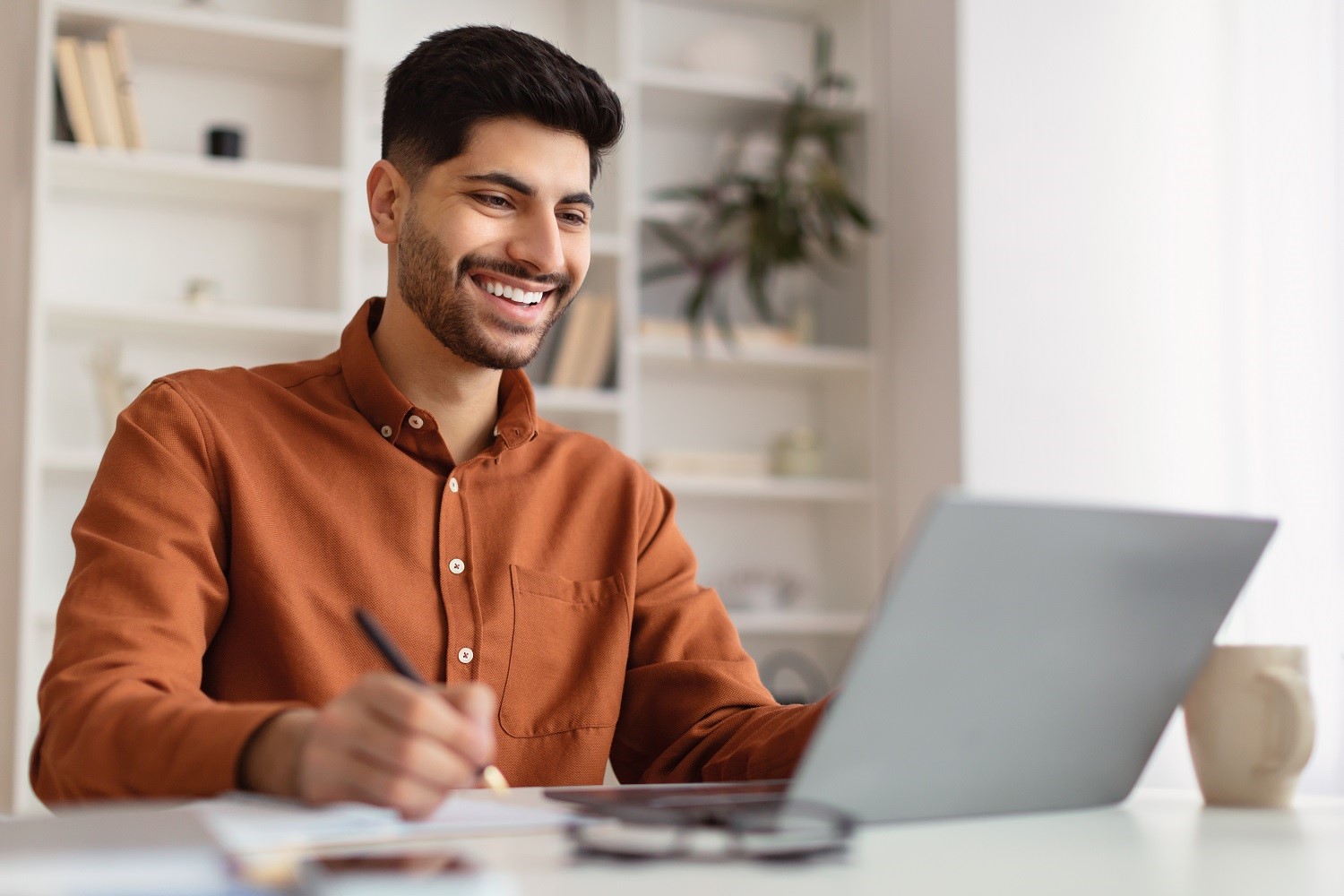 a man using a laptop