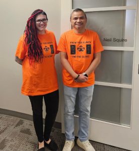 Our Calgary staff wearing orange shirts.