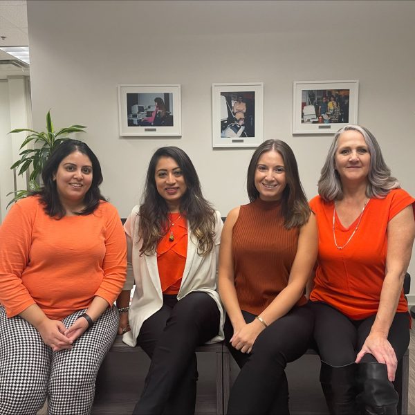 Staff from our Burnaby office wearing orange shirts.