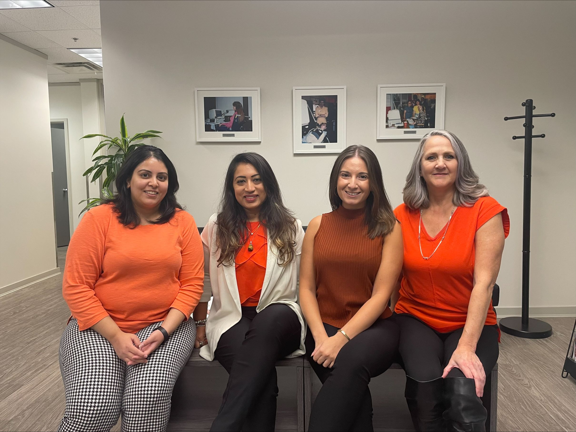 Staff from our Burnaby office wearing orange shirts.