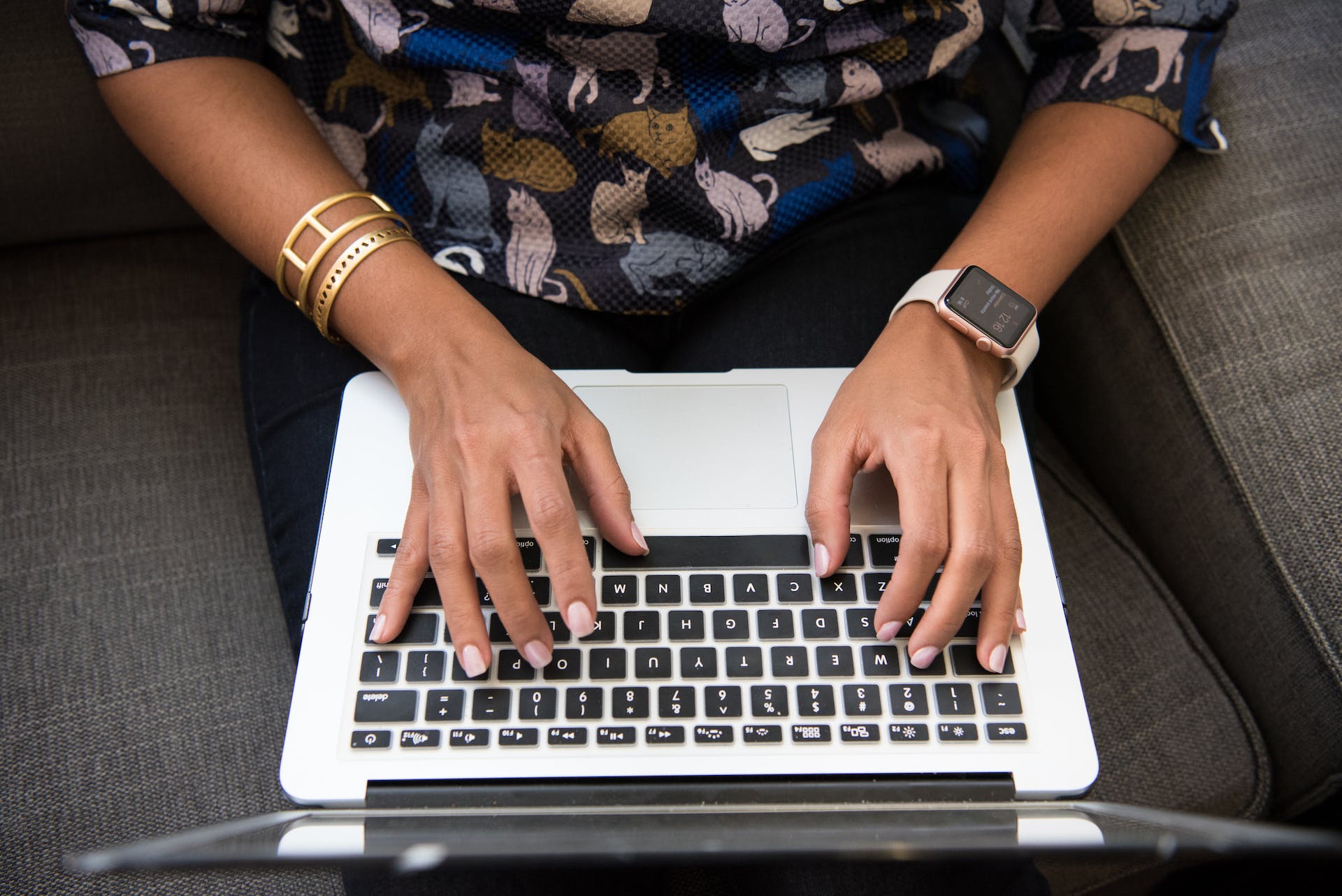 A person types on a computer.