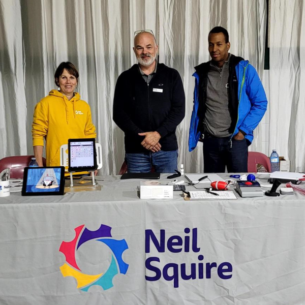 Rebekah, Serge, and Alain from our AT Help Desk team at a Neil Squire booth.