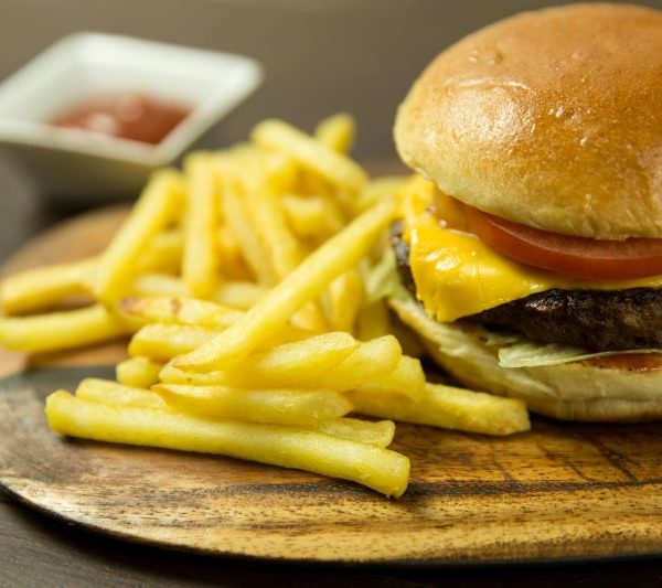A plate of a burger and fries.