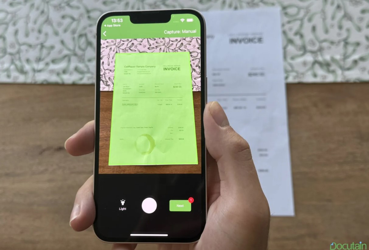 A person using Docutain to scan an invoice.