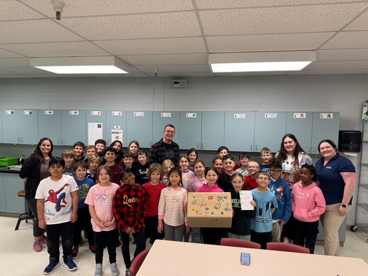 Students and teachers at École Anna-Malenfant with staff from Neil Squire and Place aux compétences.