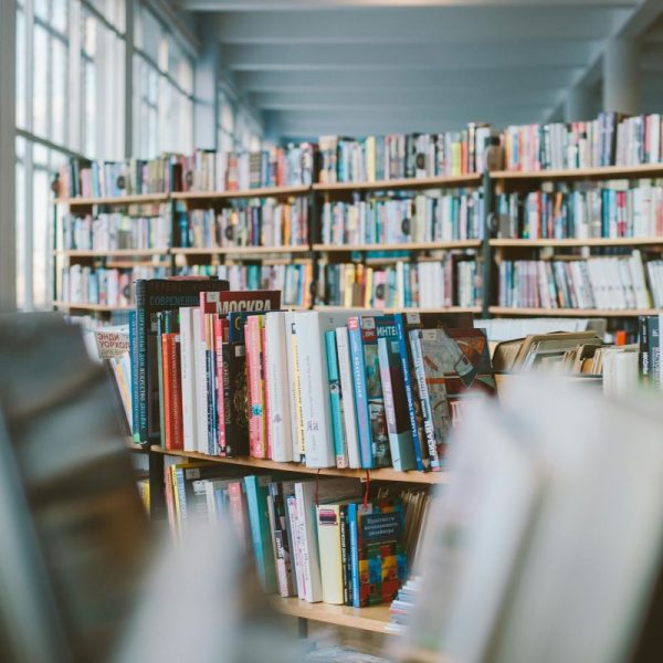 A bookshelf in a library.