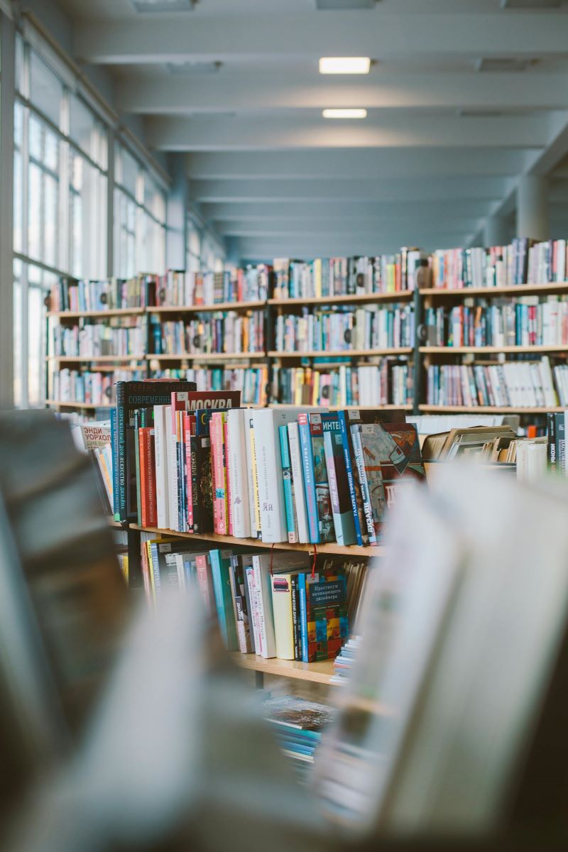 A bookshelf in a library.