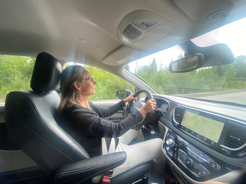 Lynn driving her van.